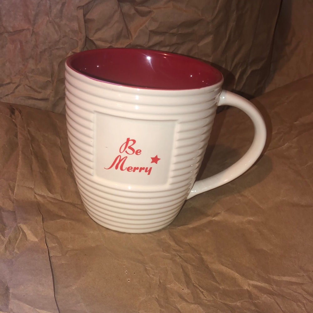 The old pottery company Be merry mug. Perfect condition.